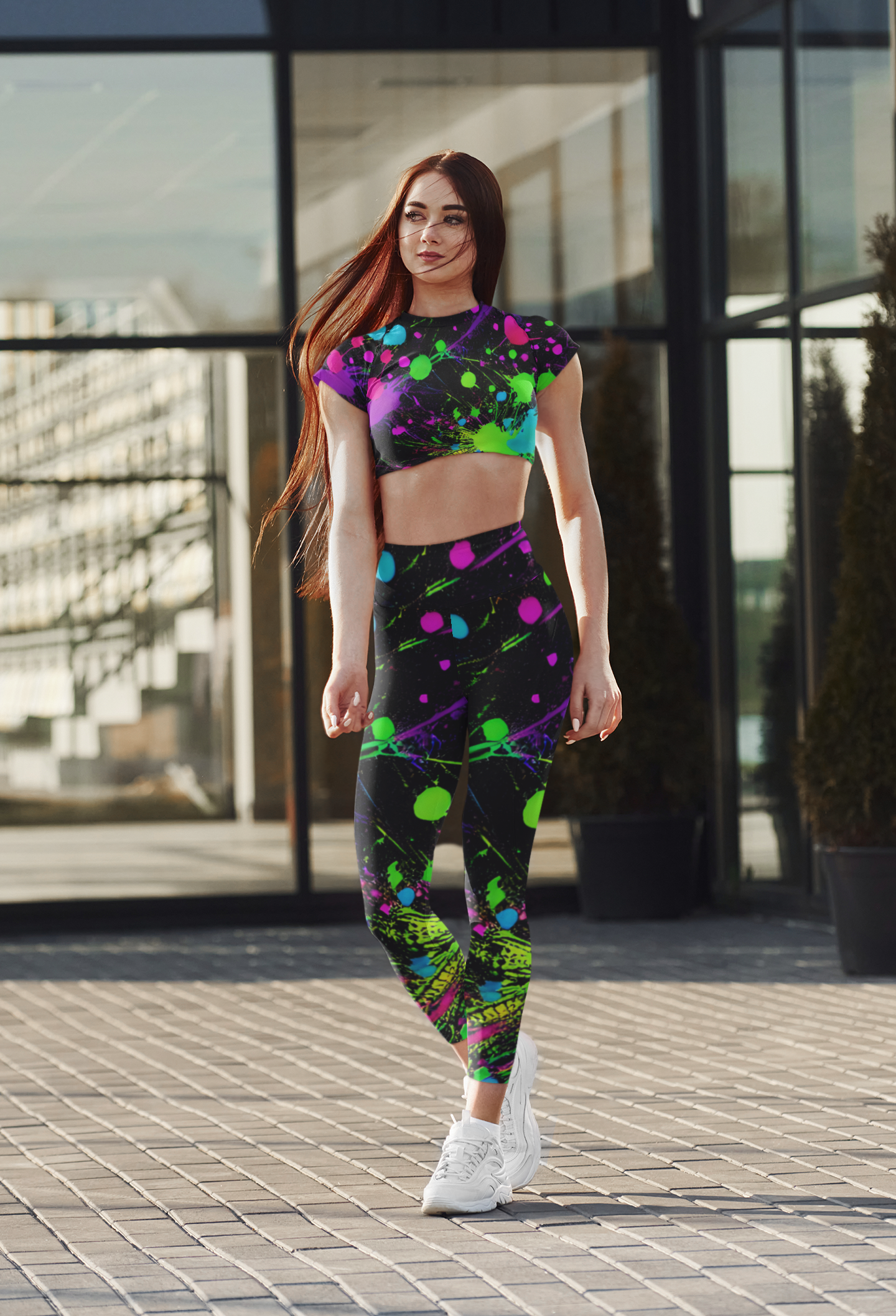 Young Lady wearing all over print crop top and leggings