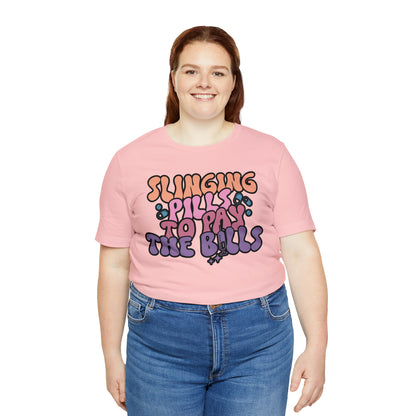 Slinging Pills to pay the Bills Comfy and Stylish Nurse T-Shirt: Gift for Nurses and Nursing Students, Soft Fabric, Various Sizes Available