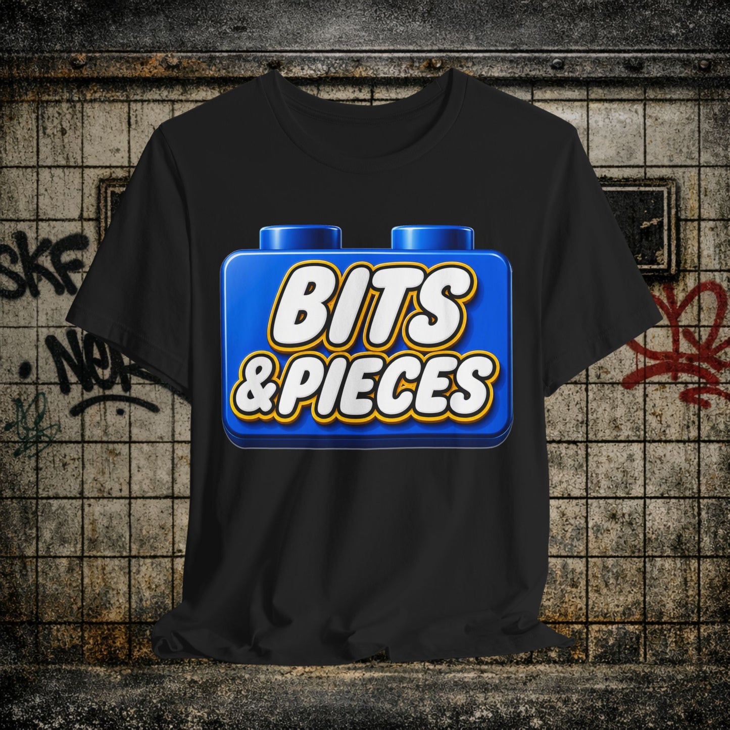 Bits & Pieces Graphic Tee One Size Fits All… Jokes?”