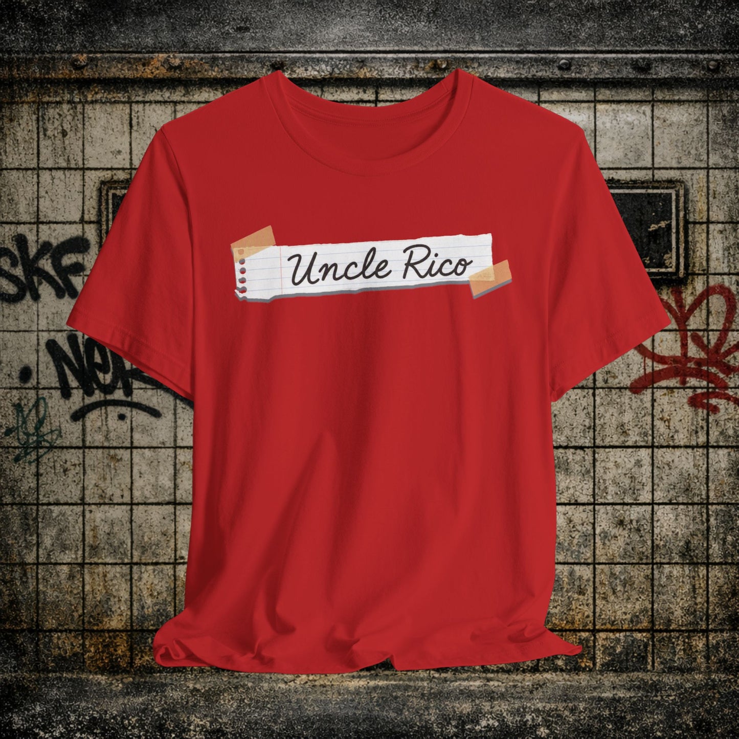 Uncle Rico Graphic Tee — Retro Notebook Tape Design