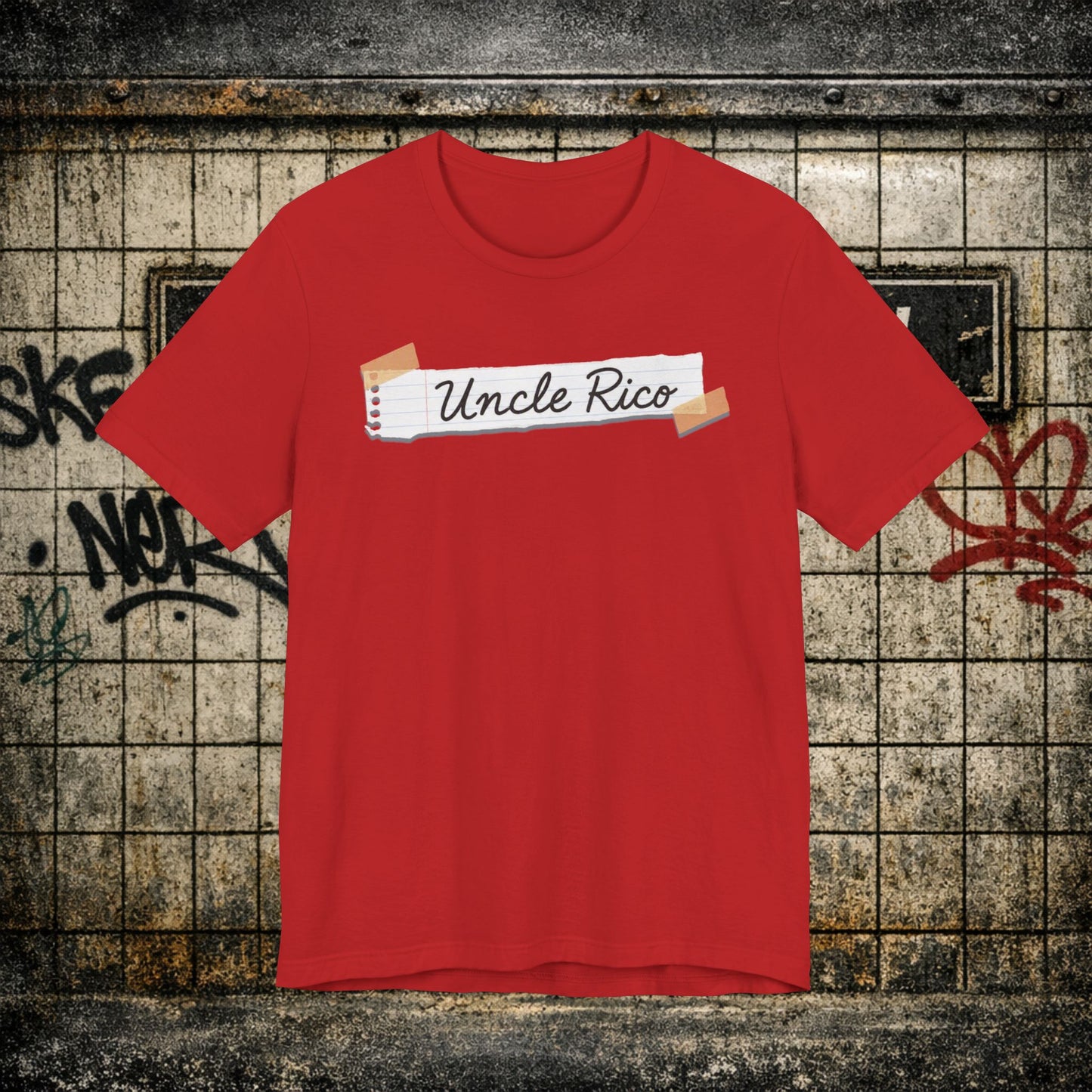 Uncle Rico Graphic Tee — Retro Notebook Tape Design