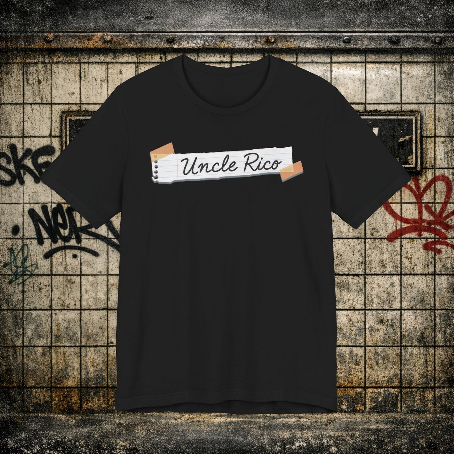 Uncle Rico Graphic Tee — Retro Notebook Tape Design