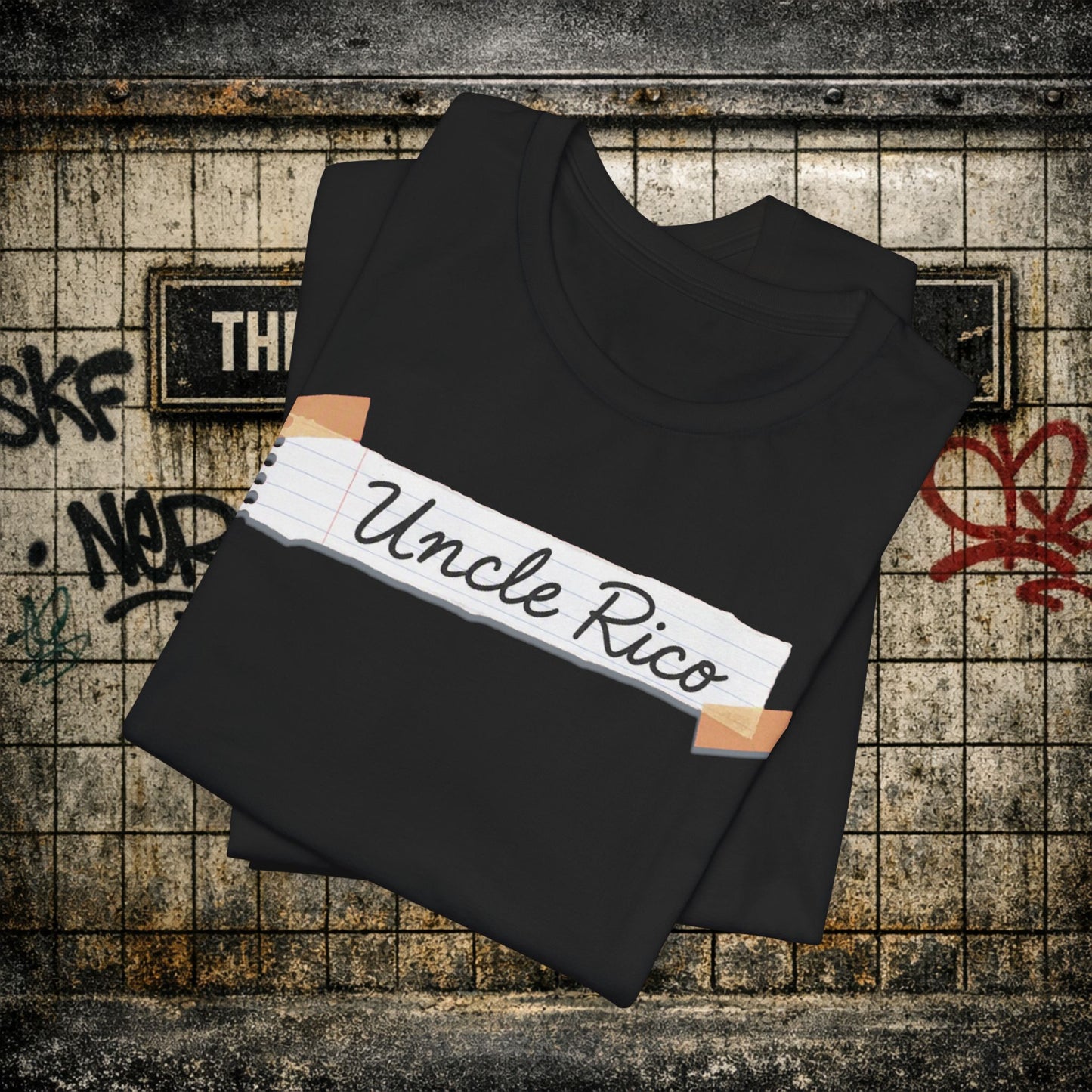 Uncle Rico Graphic Tee — Retro Notebook Tape Design