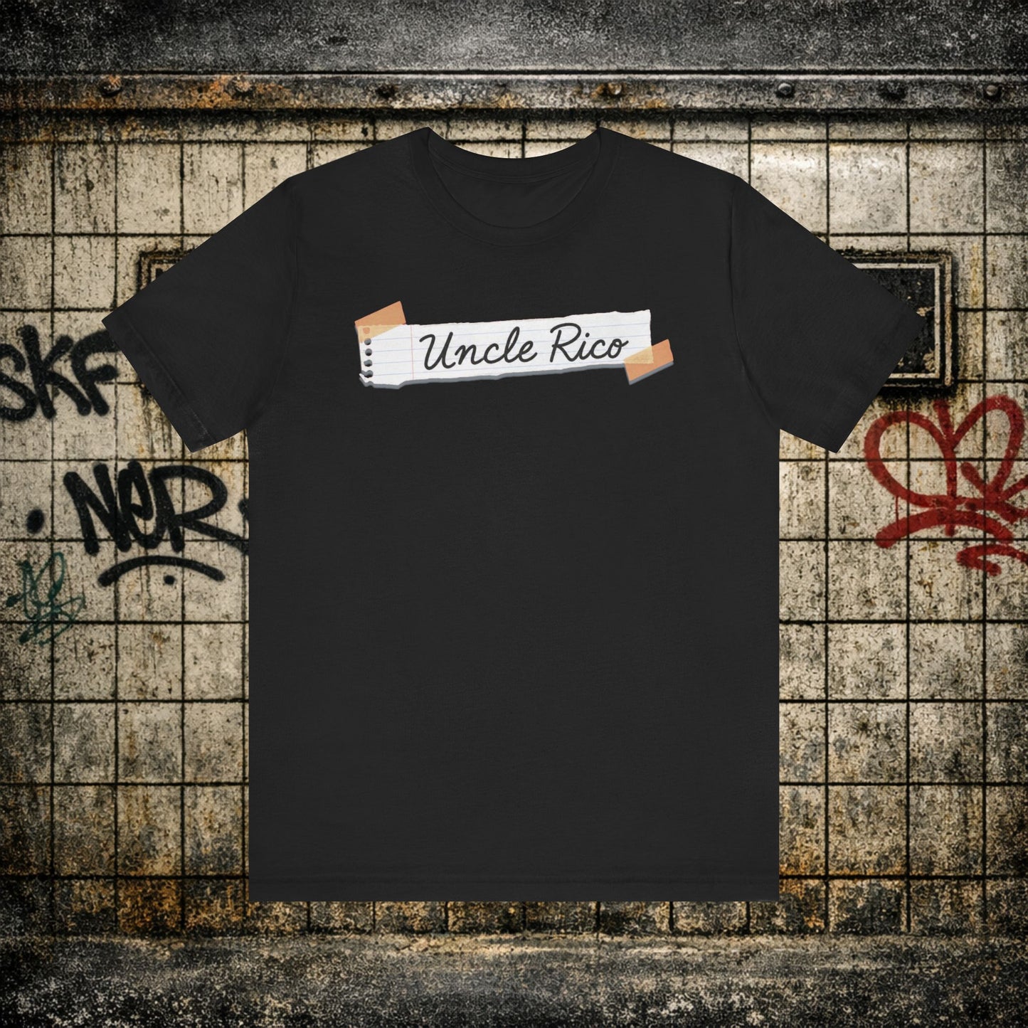 Uncle Rico Graphic Tee — Retro Notebook Tape Design