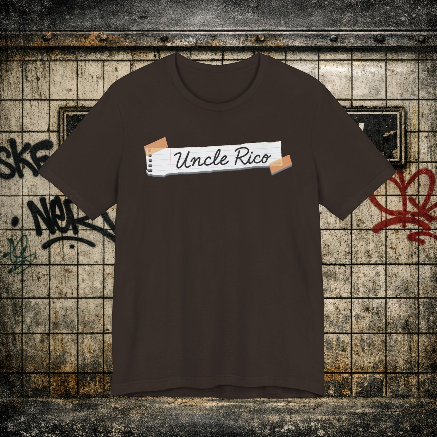 Uncle Rico Graphic Tee — Retro Notebook Tape Design