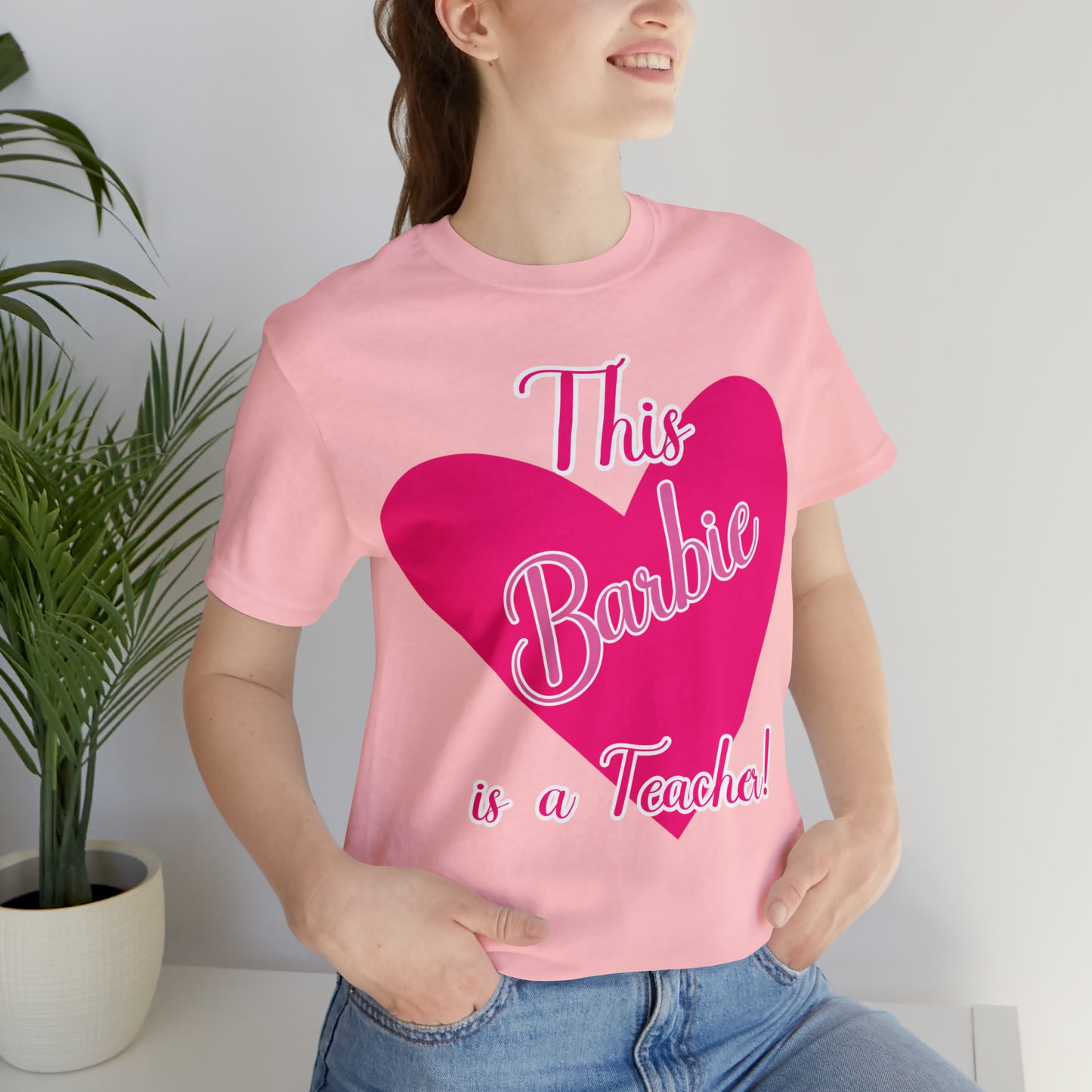 This Barbie is a Teacher Unisex Jersey Short Sleeve Tee gifts for her