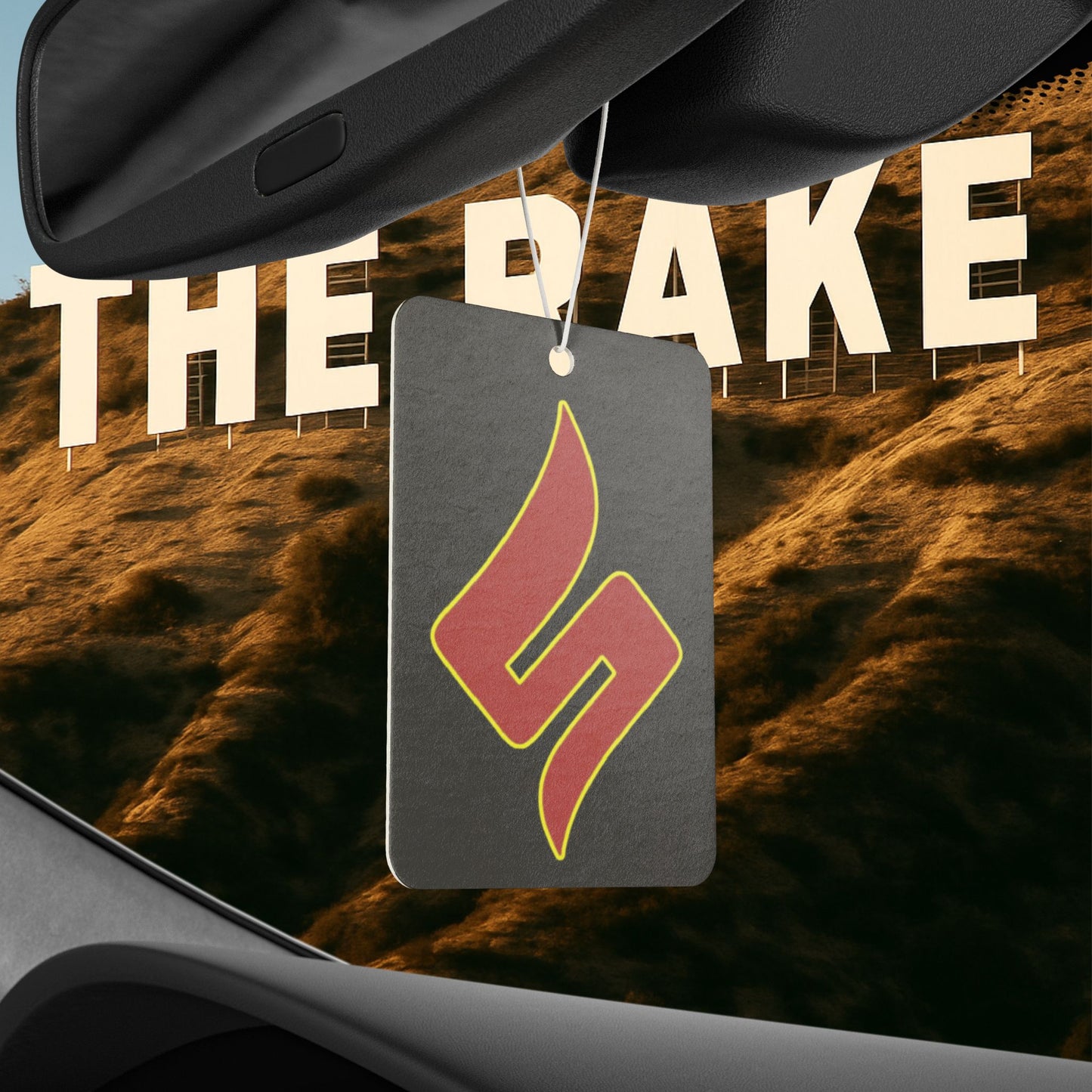 “Shuli Logo Air Freshener — For Cars That Smell Like Hot Takes”