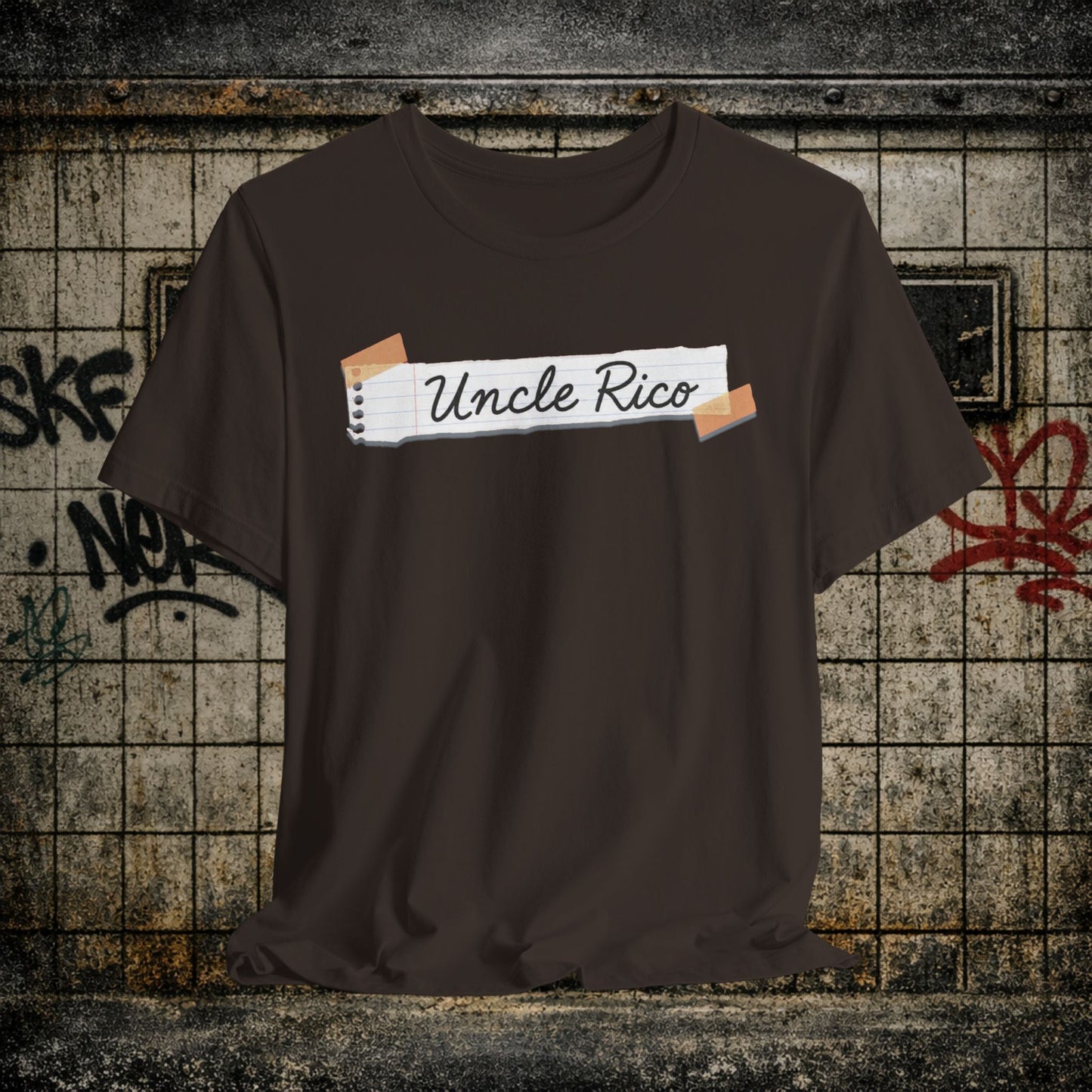 Uncle Rico Graphic Tee — Retro Notebook Tape Design