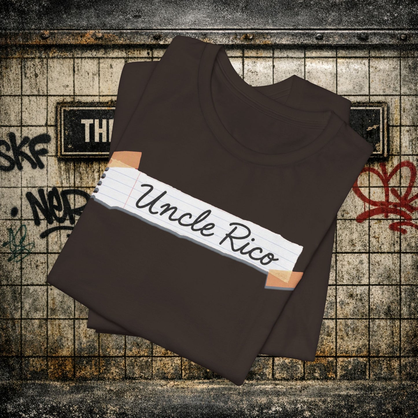 Uncle Rico Graphic Tee — Retro Notebook Tape Design