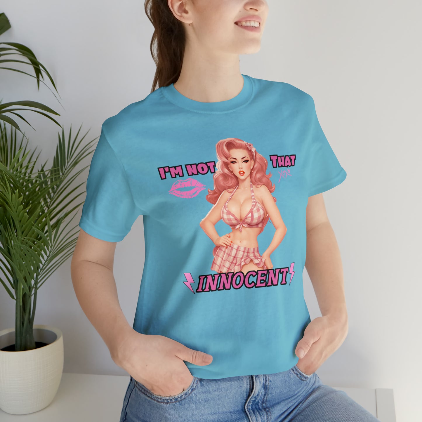 Timeless Elegance: Vintage Pink Pinup Girl "I'm not that Innocent on a Bella+Canva 3001 Unisex Jersey T-Shirt - A Must-Have Gift for her