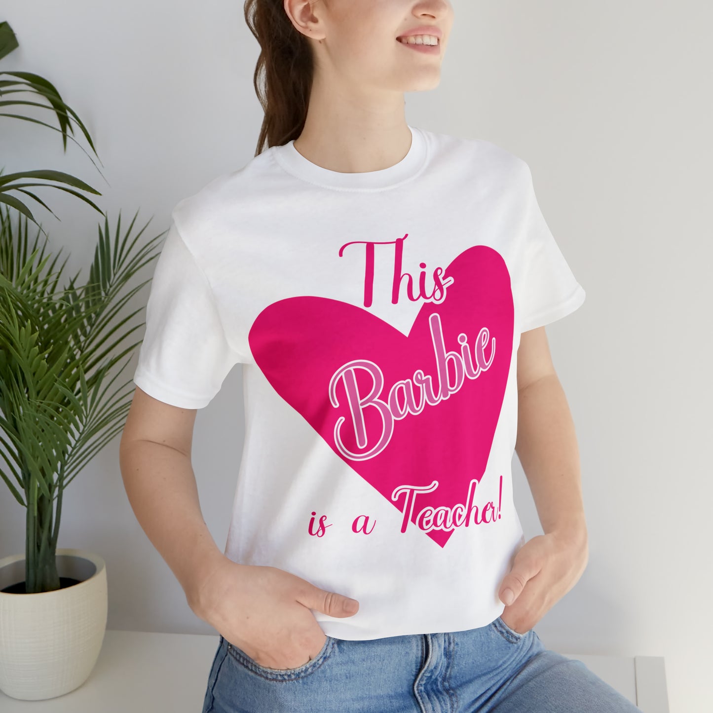 This Barbie is a Teacher Unisex Jersey Short Sleeve Tee gifts for her