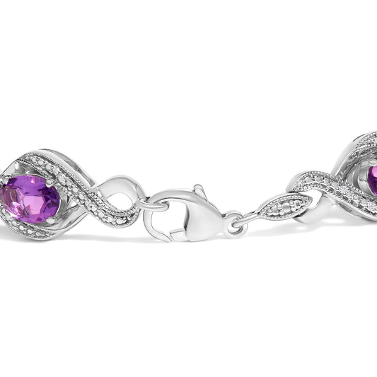 .925 Sterling Silver 1/10 Cttw Natural Round Diamond and 7X5MM Oval Amethyst Cross Tennis Bracelet (I-J Color, I1-I2 Clarity) - 7"